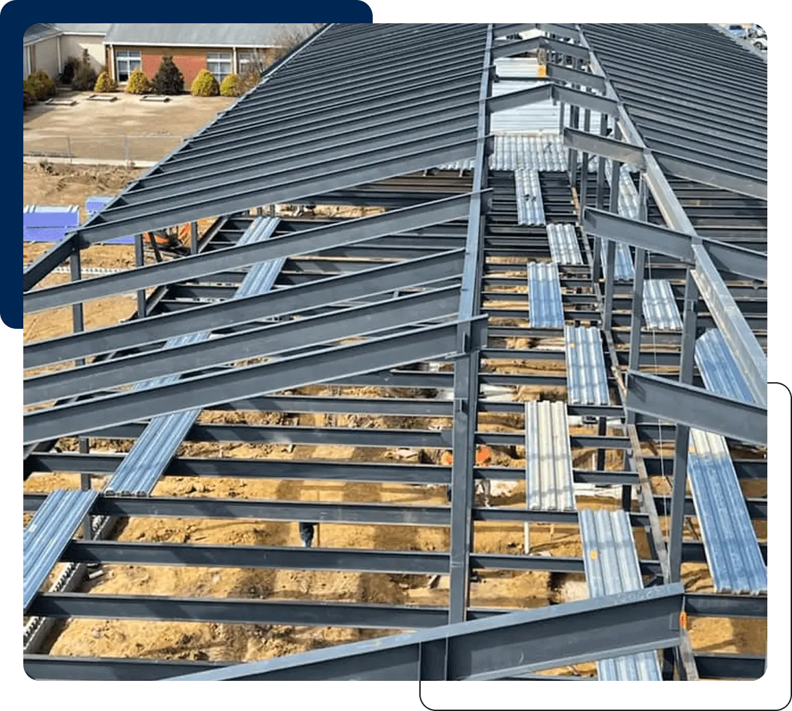 Steel framing structure under construction on a building site.